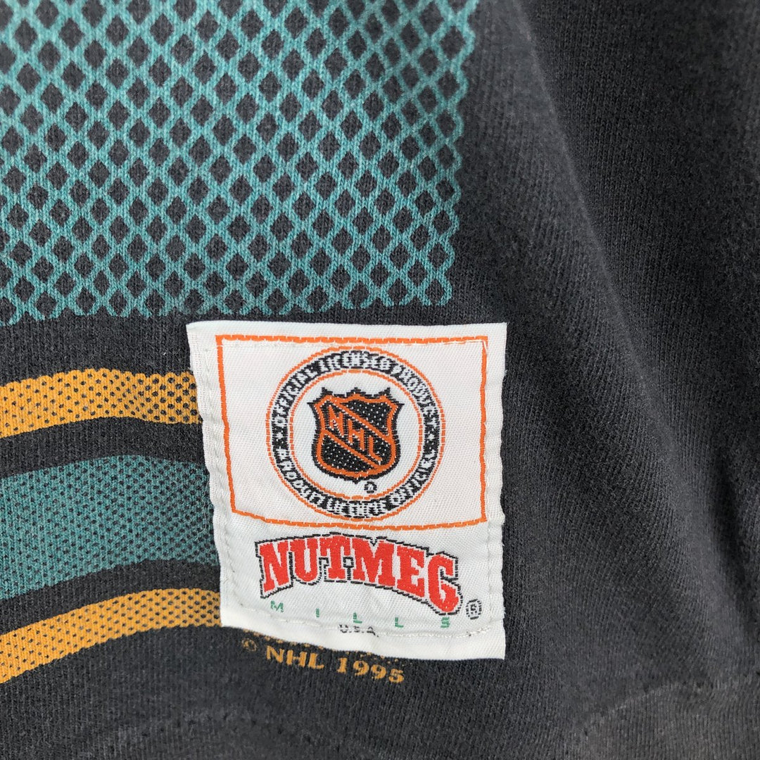 90'S NUTMEG NHL Anaheim Mighty Daks All-Over Print Sports Print T-Shirt, Made in England, Men's Size M (approx.) cotton black type Vintage Second Hand