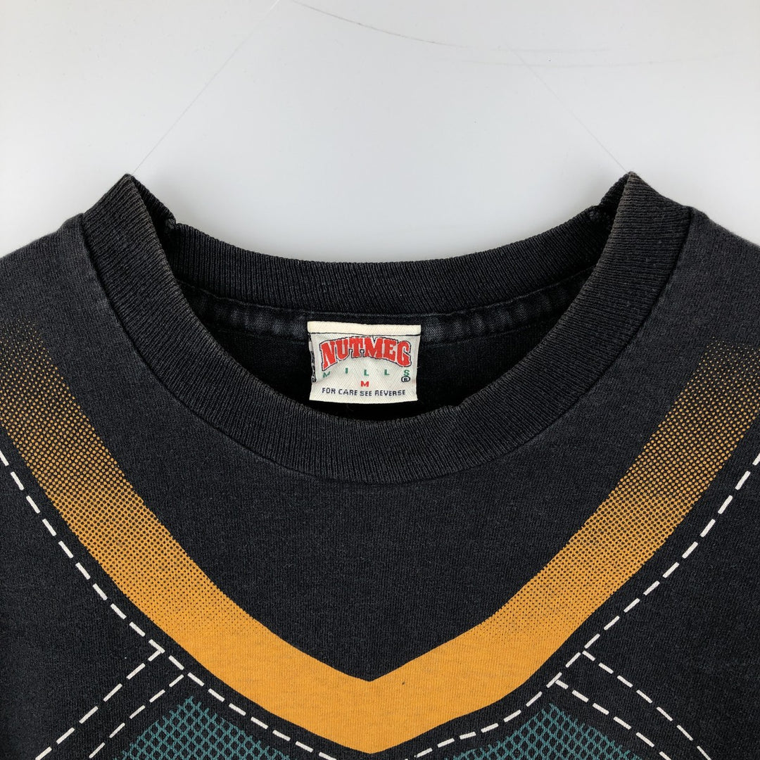 90'S NUTMEG NHL Anaheim Mighty Daks All-Over Print Sports Print T-Shirt, Made in England, Men's Size M (approx.) cotton black type Vintage Second Hand