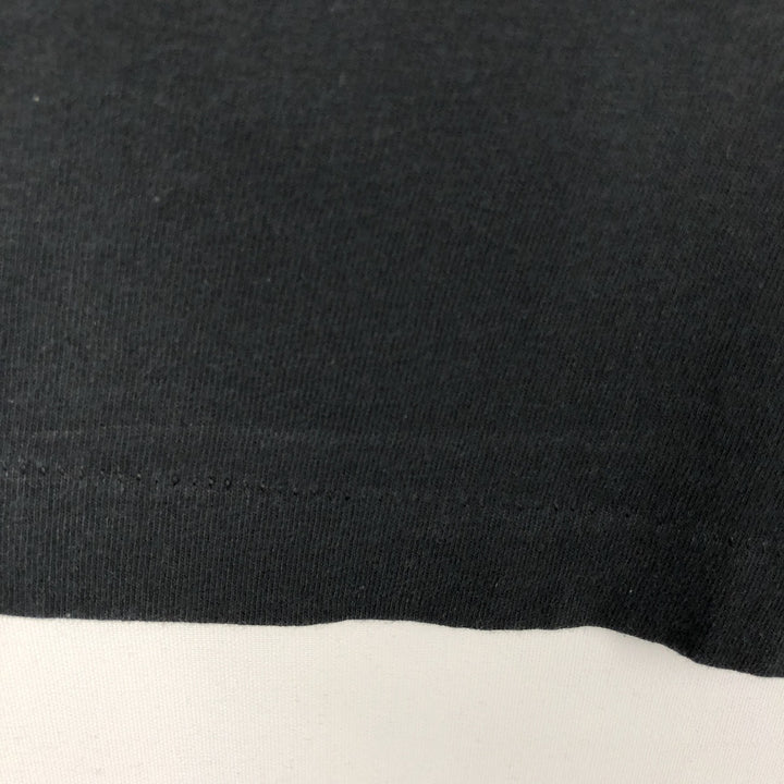 90'S Reebok T-shirt with large logo print, made in USA, men's size M equivalent, vintage. cotton black type Vintage Second Hand
