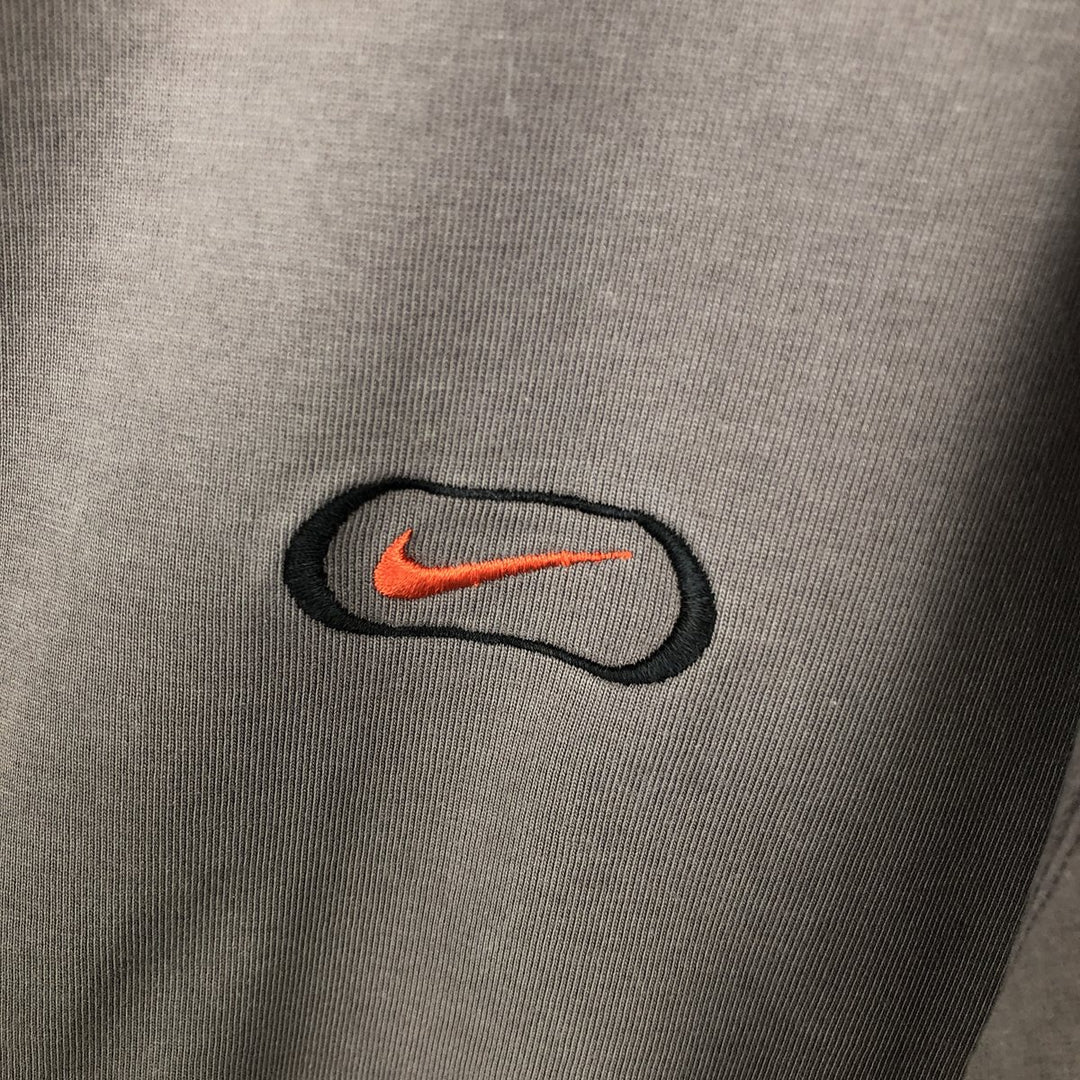 90s-era Nike V-neck T-shirt with a single logo, men's size M equivalent, vintage. cotton Khaki type beige Vintage Second Hand