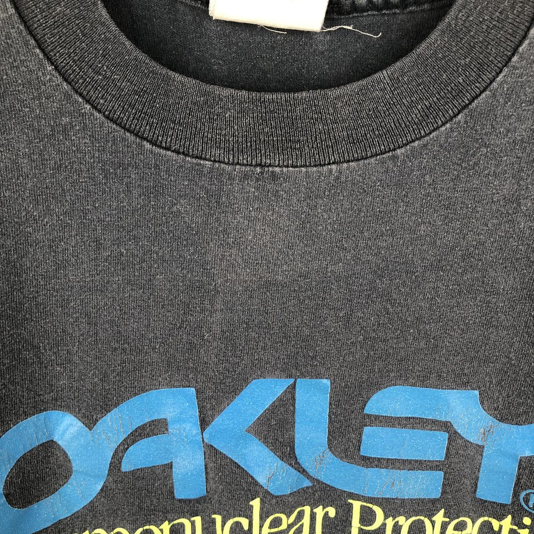 90'S Oakley logo print T-shirt, made in USA, men's size S equivalent, vintage. cotton black type Vintage Second Hand