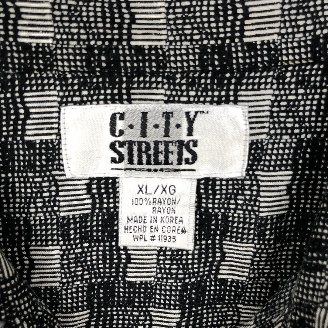 CITY STREETS all-over print short-sleeved rayon shirt, boxy fit, men's size XL. Rayon black type Vintage Second Hand