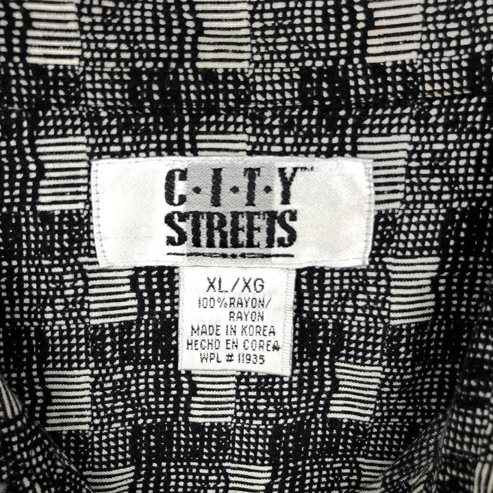 CITY STREETS all-over print short-sleeved rayon shirt, boxy fit, men's size XL. Rayon black type Vintage Second Hand