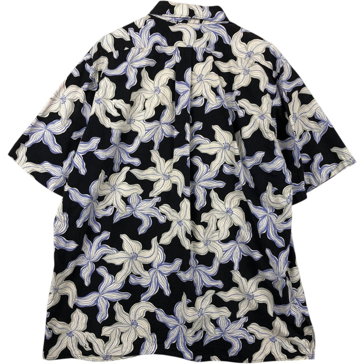 90'S Reyn Spooner swimwear tag, bikini tag, all-over floral print, Hawaiian Aloha shirt, boxy shirt, men's size XXL equivalent. cotton black type Vintage Second Hand