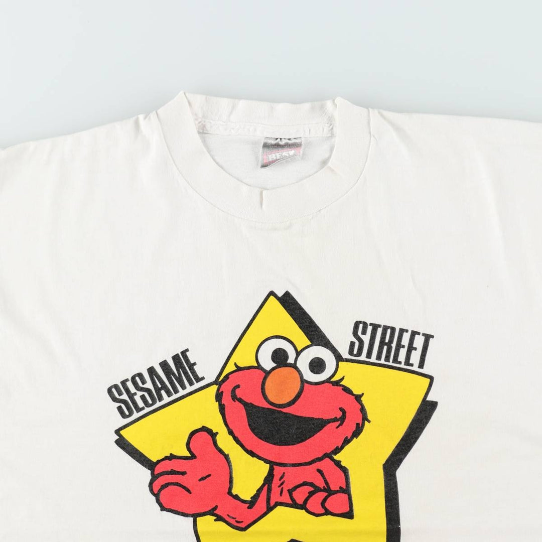 90'S Fruit of the Loom Sesame Street Elmo Character Print T-Shirt, Made in USA, Men's XL equivalent, Vintage unclear white type Vintage Second Hand