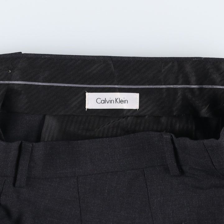 Calvin Klein wool trousers/slacks for men, equivalent to size W35. wool Charcoal Vintage Second Hand