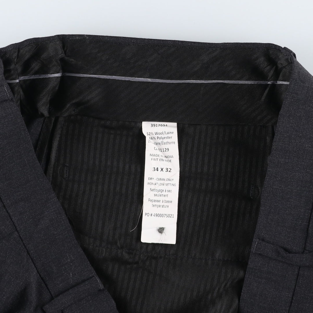 Calvin Klein wool trousers/slacks for men, equivalent to size W35. wool Charcoal Vintage Second Hand
