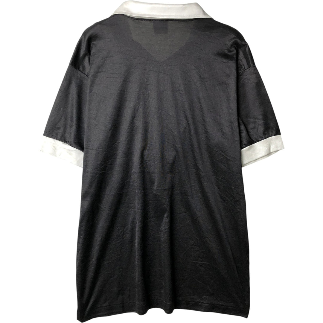 90'S Umbro V-neck collared soccer jersey game shirt, made in USA, men's size XL equivalent, vintage. polyester black type Vintage Second Hand