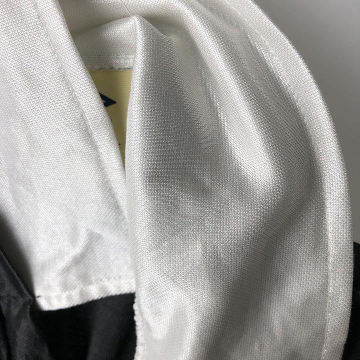 90'S Umbro V-neck collared soccer jersey game shirt, made in USA, men's size XL equivalent, vintage. polyester black type Vintage Second Hand
