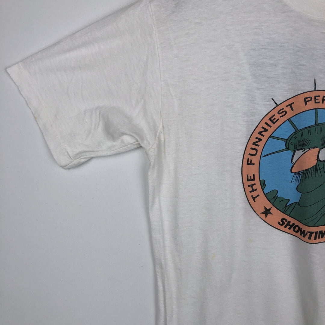 80'S CALIFORNIA GOLD THE FUNNIEST PERSON IN AMERICA Print T-Shirt, Made in USA, Men's XL equivalent, Vintage polyester white type Vintage Second Hand
