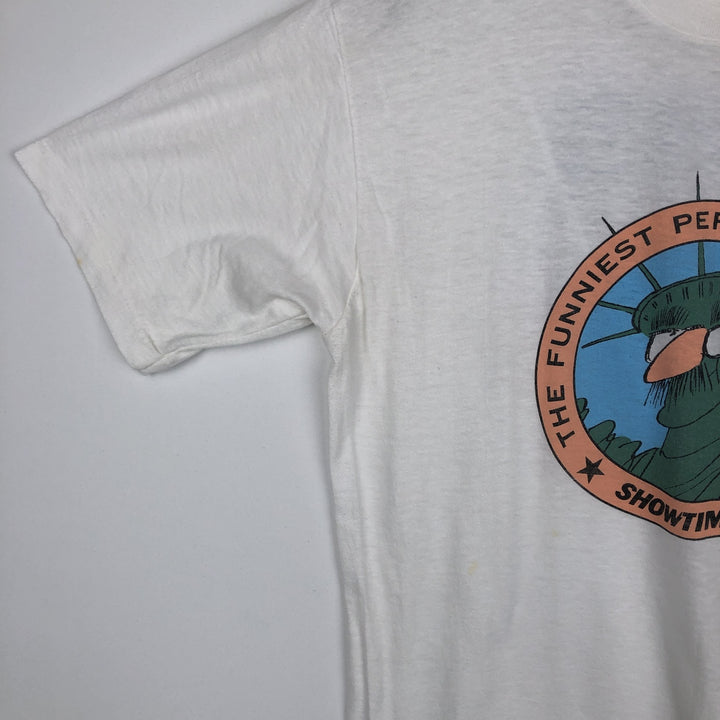 80'S CALIFORNIA GOLD THE FUNNIEST PERSON IN AMERICA Print T-Shirt, Made in USA, Men's XL equivalent, Vintage polyester white type Vintage Second Hand