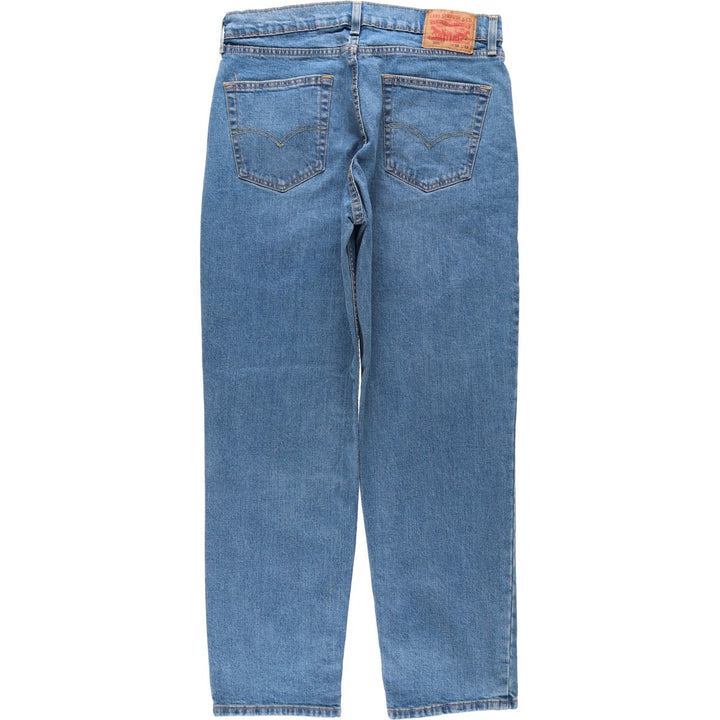 Levi's 550 tapered denim pants for men, size W34 cotton blue type Vintage Second Hand