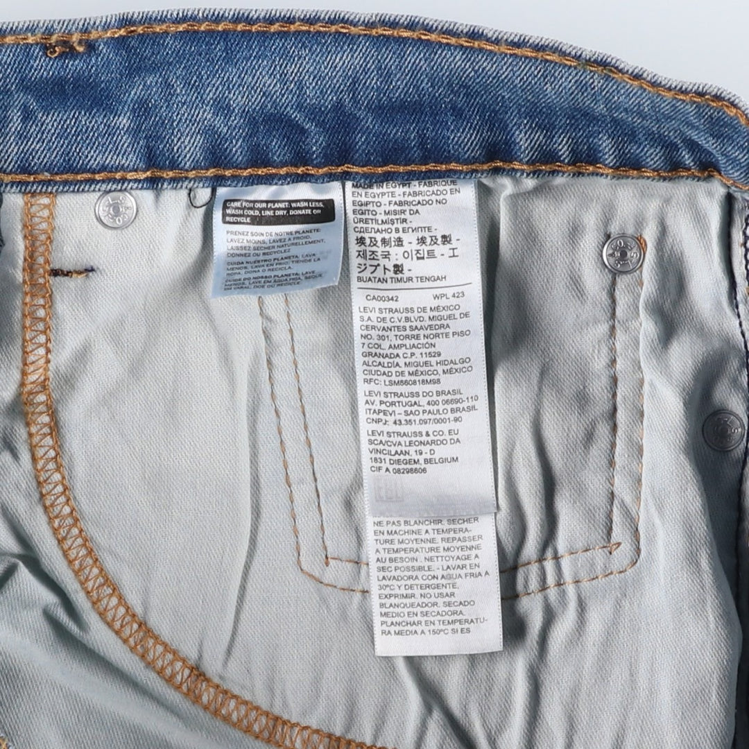 Levi's 550 tapered denim pants for men, size W34 cotton blue type Vintage Second Hand