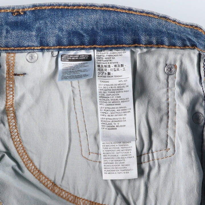 Levi's 550 tapered denim pants for men, size W34 cotton blue type Vintage Second Hand