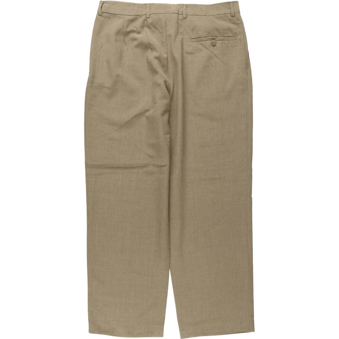 Men's slacks, made in Spain, equivalent to size W34. wool beige type brown Vintage Second Hand
