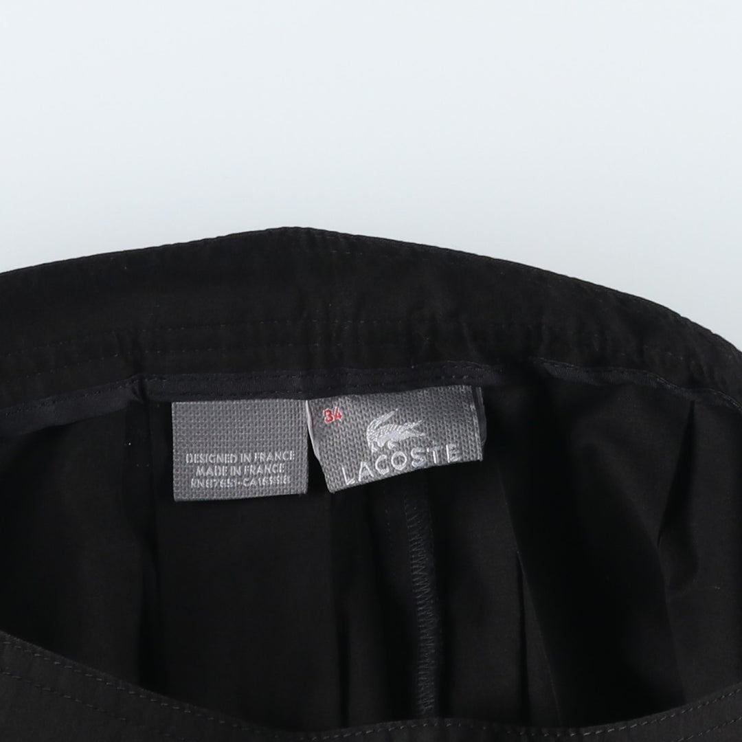 Lacoste LACOSTE French design, front opening, cotton pleated mini skirt, made in France, women's size S equivalent. cotton black type Vintage Second Hand
