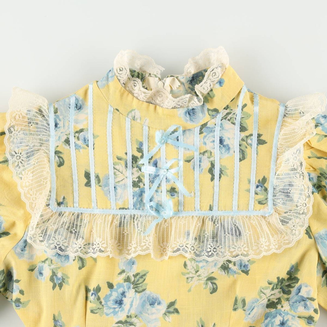All-over floral print maxi dress with three-quarter sleeves and flared hem, women's size M equivalent, vintage. unclear yellow type Vintage Second Hand