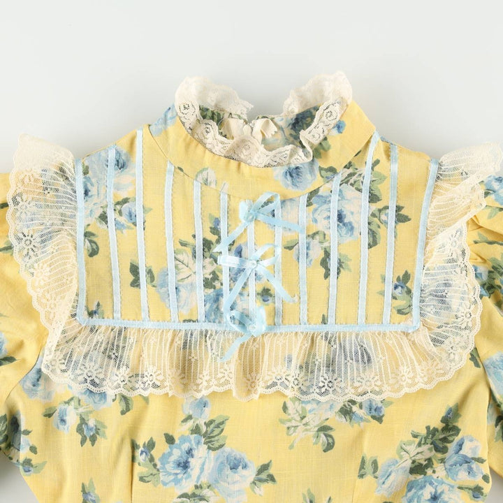 All-over floral print maxi dress with three-quarter sleeves and flared hem, women's size M equivalent, vintage. unclear yellow type Vintage Second Hand