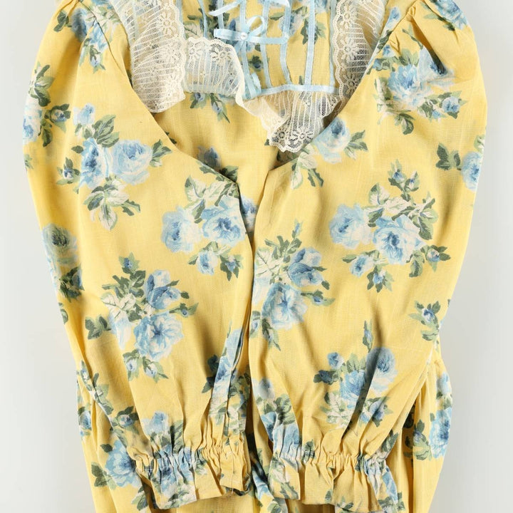 All-over floral print maxi dress with three-quarter sleeves and flared hem, women's size M equivalent, vintage. unclear yellow type Vintage Second Hand