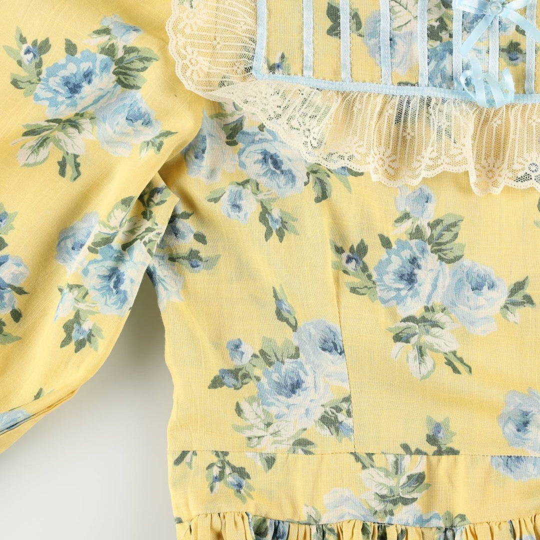 All-over floral print maxi dress with three-quarter sleeves and flared hem, women's size M equivalent, vintage. unclear yellow type Vintage Second Hand