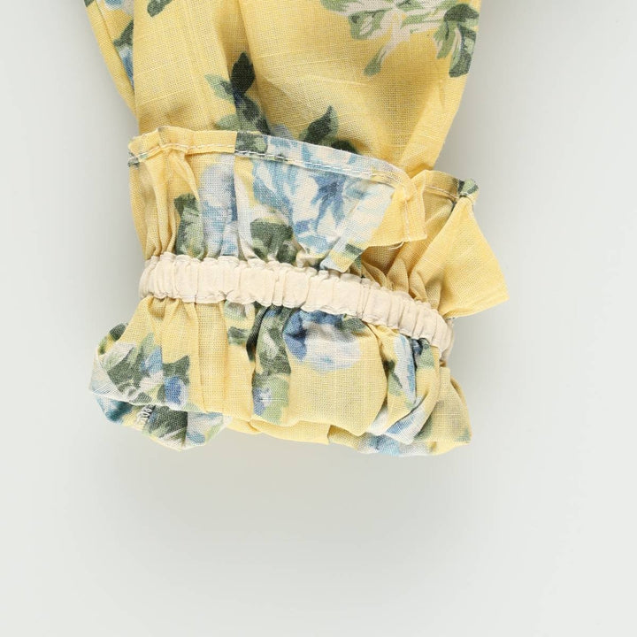 All-over floral print maxi dress with three-quarter sleeves and flared hem, women's size M equivalent, vintage. unclear yellow type Vintage Second Hand