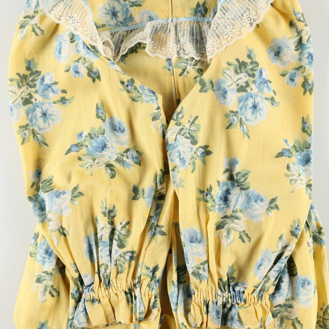 All-over floral print maxi dress with three-quarter sleeves and flared hem, women's size M equivalent, vintage. unclear yellow type Vintage Second Hand