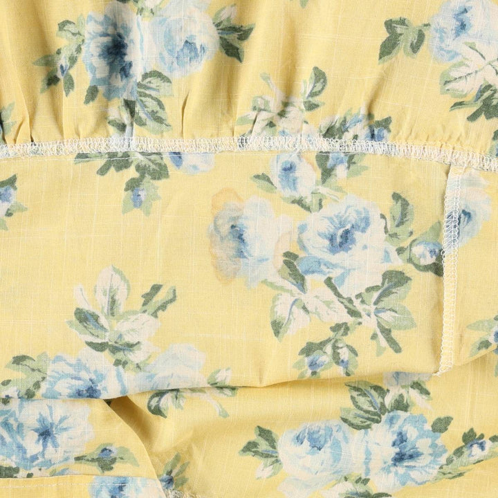 All-over floral print maxi dress with three-quarter sleeves and flared hem, women's size M equivalent, vintage. unclear yellow type Vintage Second Hand