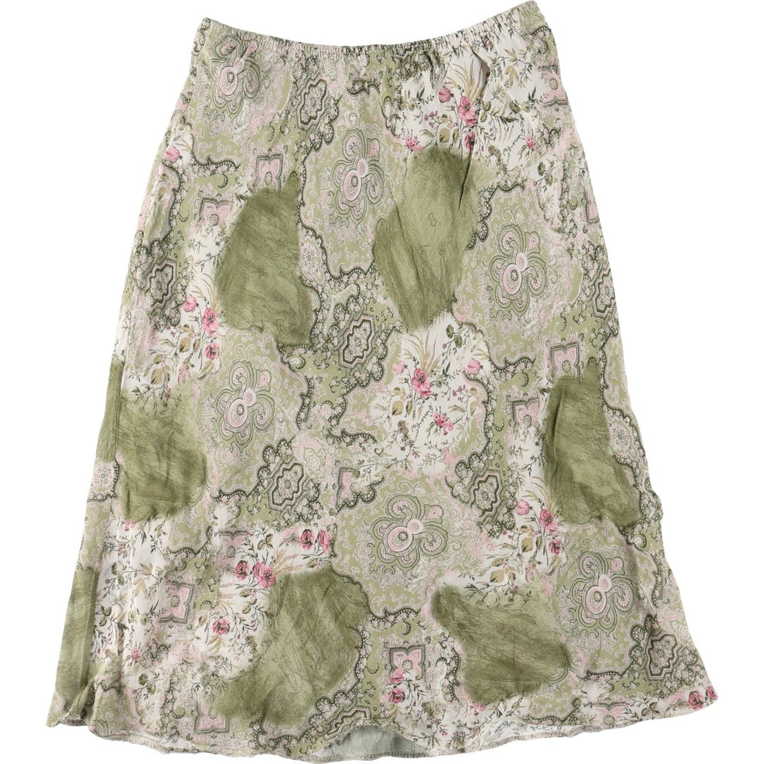 All-over botanical pattern, half-length A-line skirt, made in France, women's size M equivalent. Viscose green type yellow green Vintage Second Hand