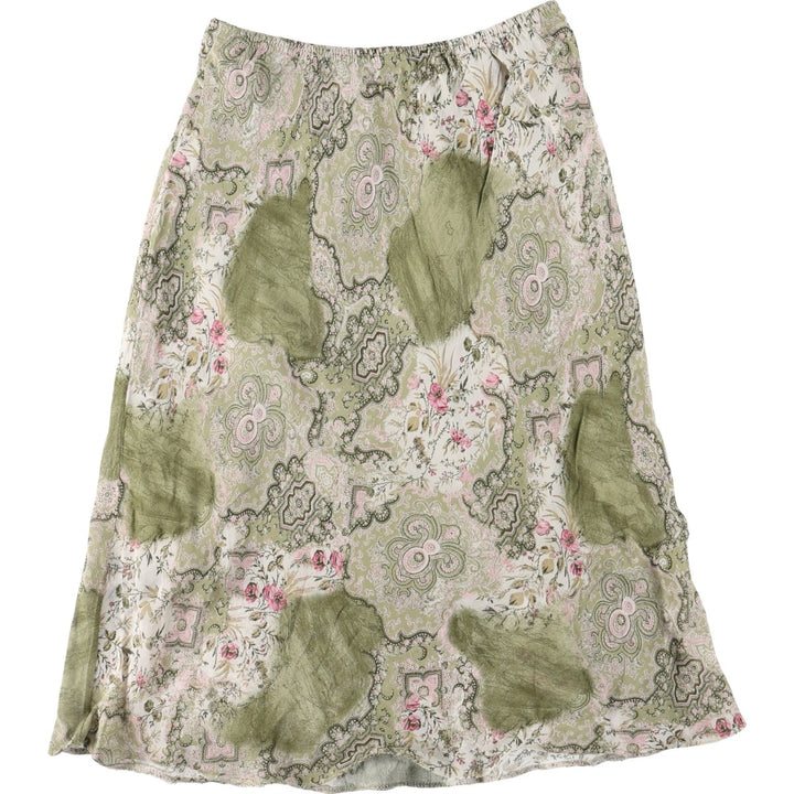All-over botanical pattern, half-length A-line skirt, made in France, women's size M equivalent. Viscose green type yellow green Vintage Second Hand