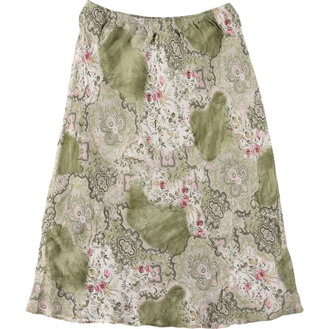All-over botanical pattern, half-length A-line skirt, made in France, women's size M equivalent. Viscose green type yellow green Vintage Second Hand