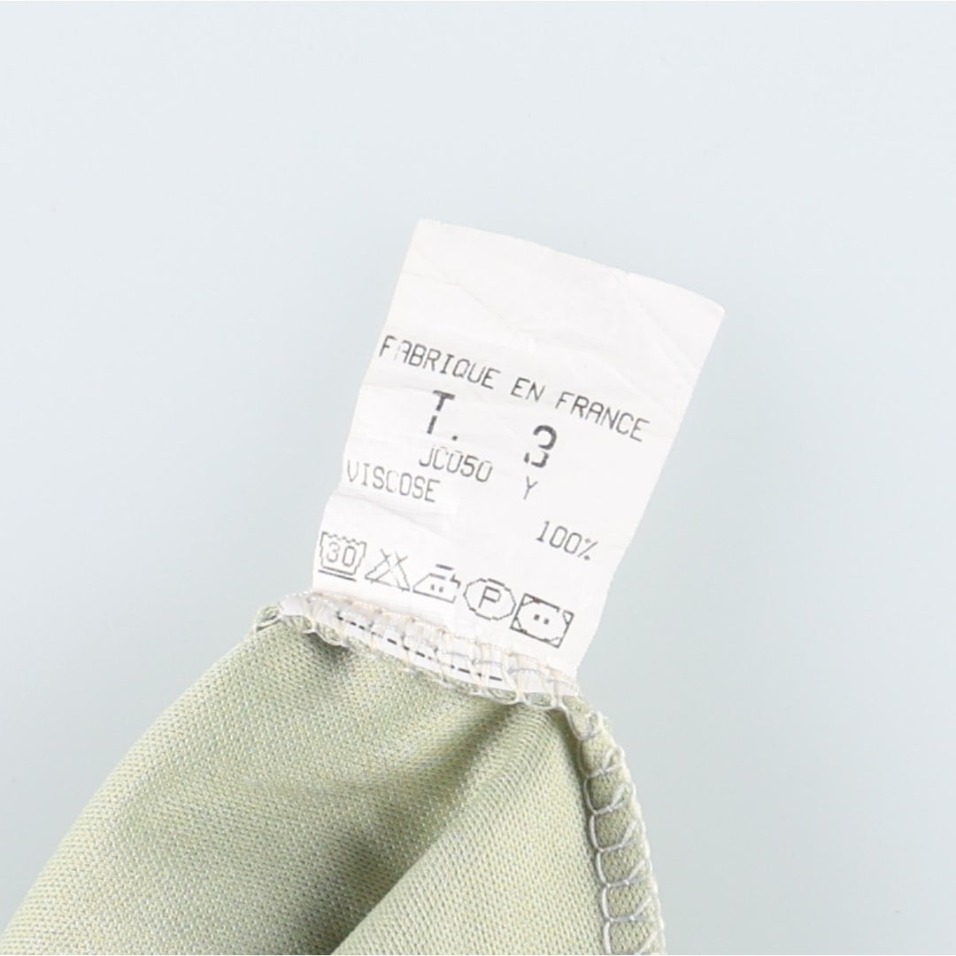 All-over botanical pattern, half-length A-line skirt, made in France, women's size M equivalent. Viscose green type yellow green Vintage Second Hand