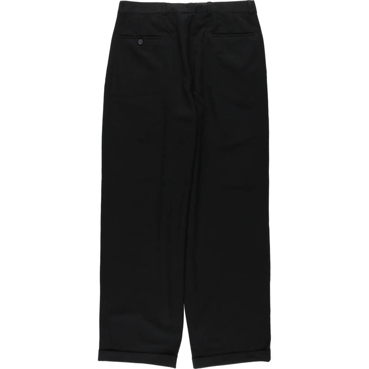 Vintage two-pleat slacks for men, size W32 unclear black type Vintage Second Hand
