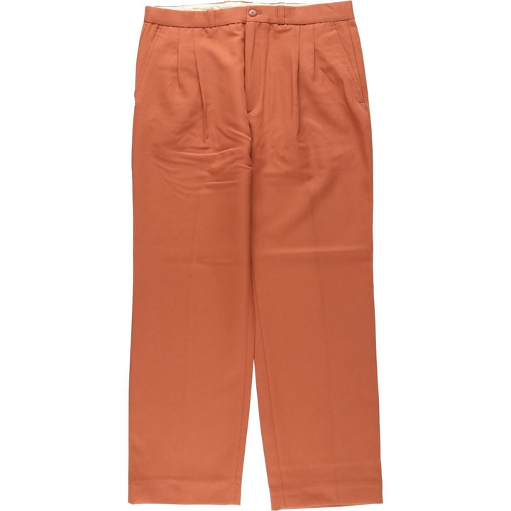 Two-pleat slacks for men, size W34 unclear orange type Vintage Second Hand
