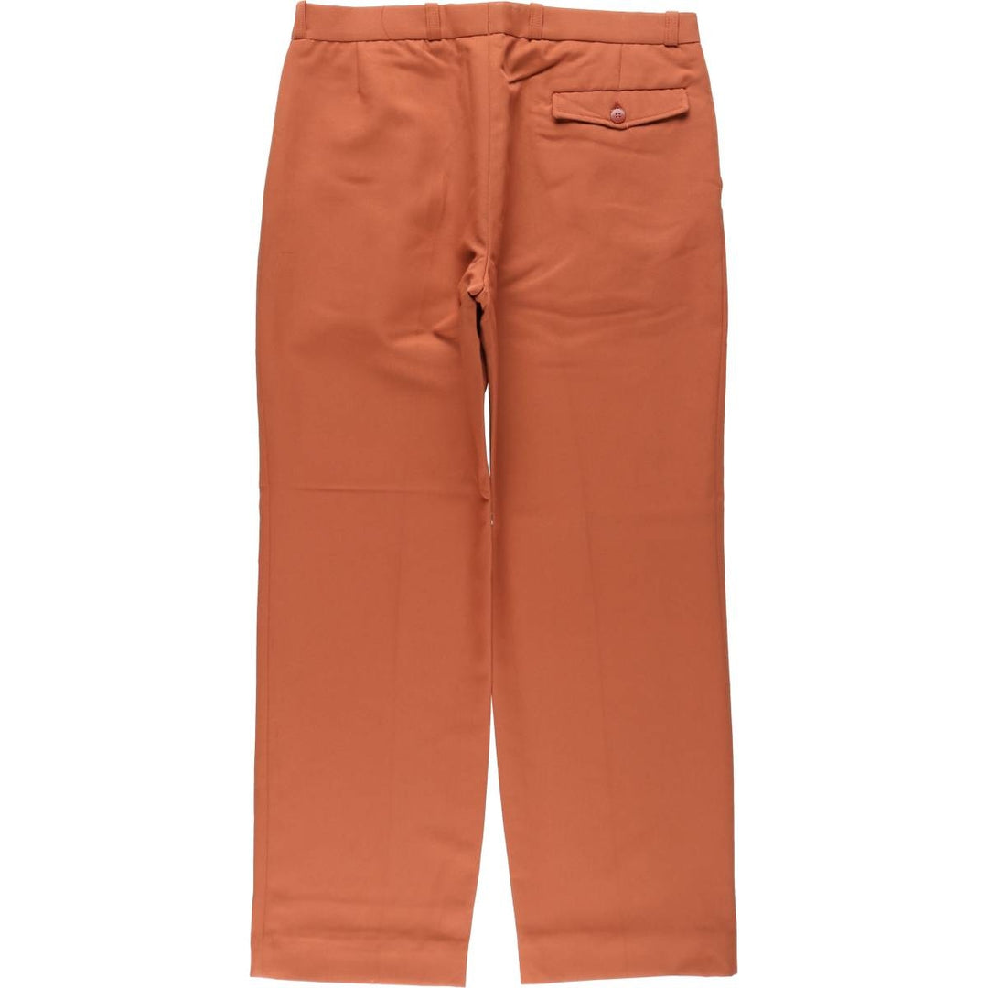 Two-pleat slacks for men, size W34 unclear orange type Vintage Second Hand