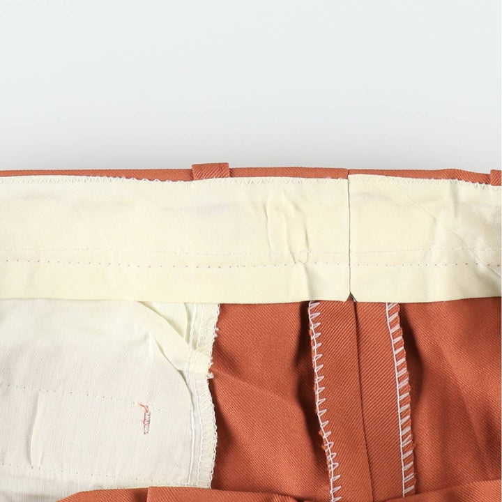 Two-pleat slacks for men, size W34 unclear orange type Vintage Second Hand