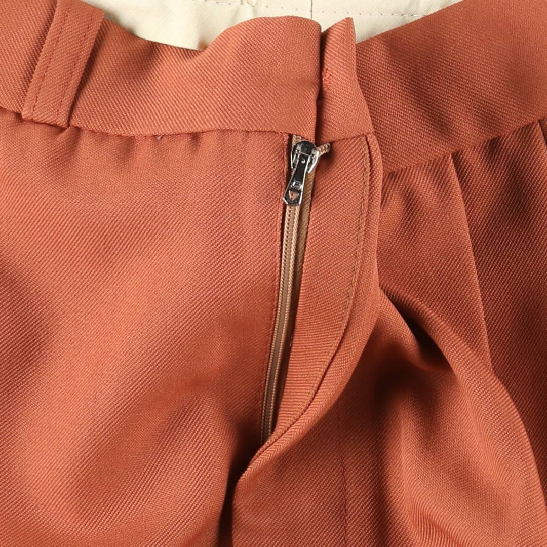 Two-pleat slacks for men, size W34 unclear orange type Vintage Second Hand