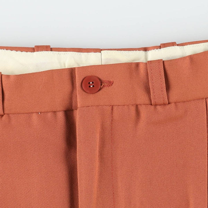 Two-pleat slacks for men, size W34 unclear orange type Vintage Second Hand
