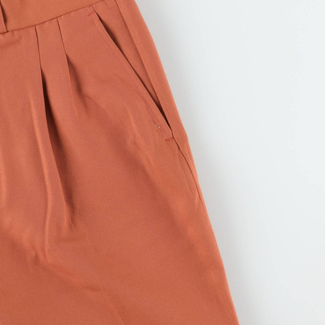Two-pleat slacks for men, size W34 unclear orange type Vintage Second Hand