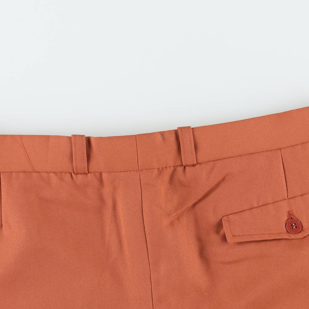 Two-pleat slacks for men, size W34 unclear orange type Vintage Second Hand