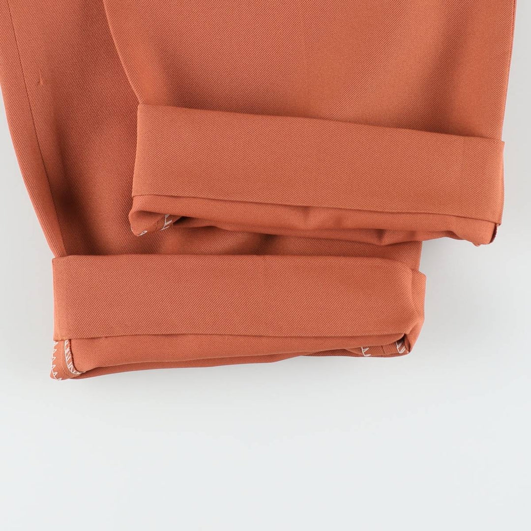 Two-pleat slacks for men, size W34 unclear orange type Vintage Second Hand
