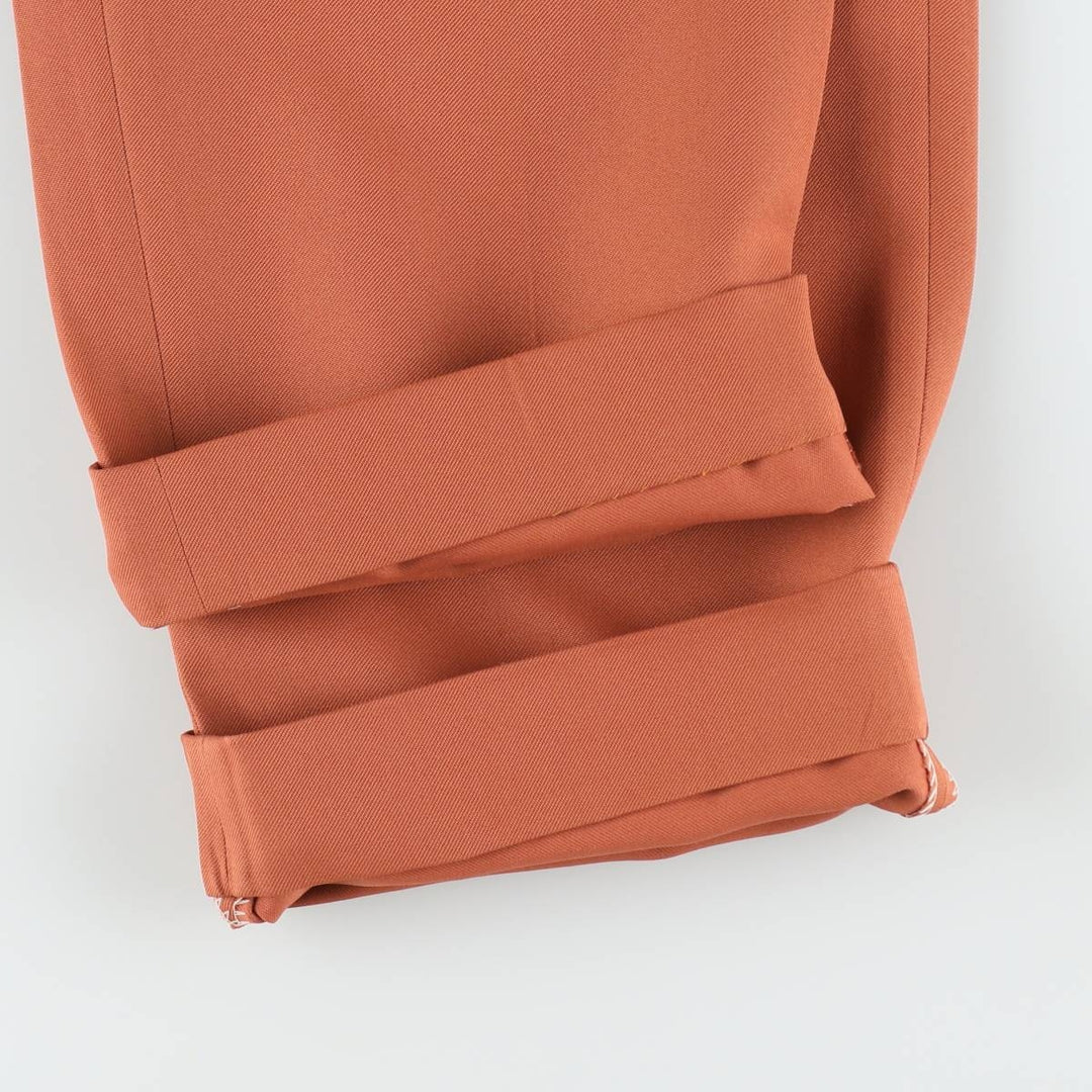 Two-pleat slacks for men, size W34 unclear orange type Vintage Second Hand