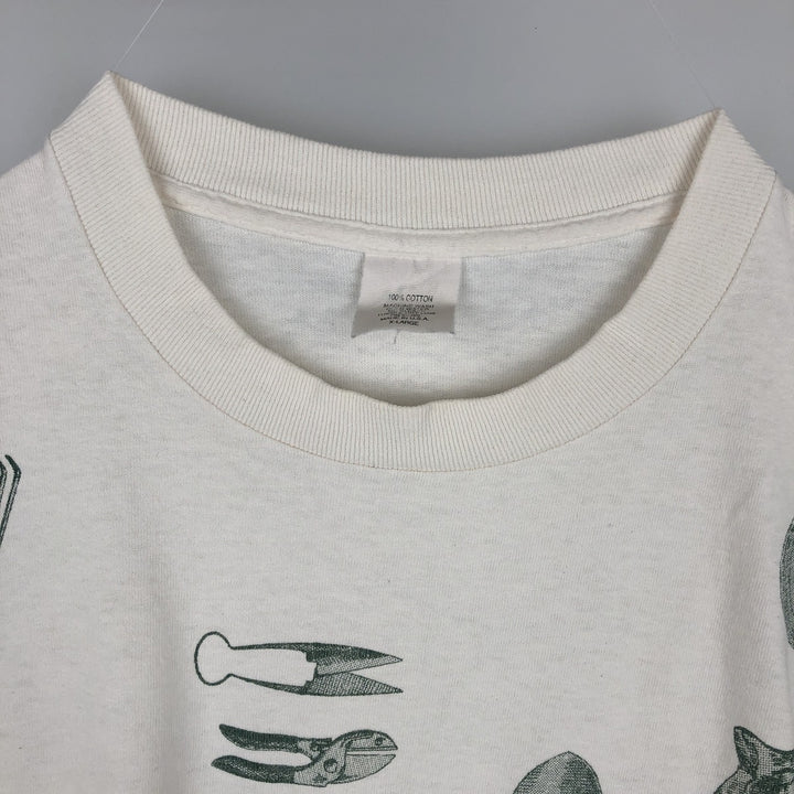 90'S rel.e.vant.products printed T-shirt, made in USA, men's size XL equivalent, vintage. cotton ivory Vintage Second Hand