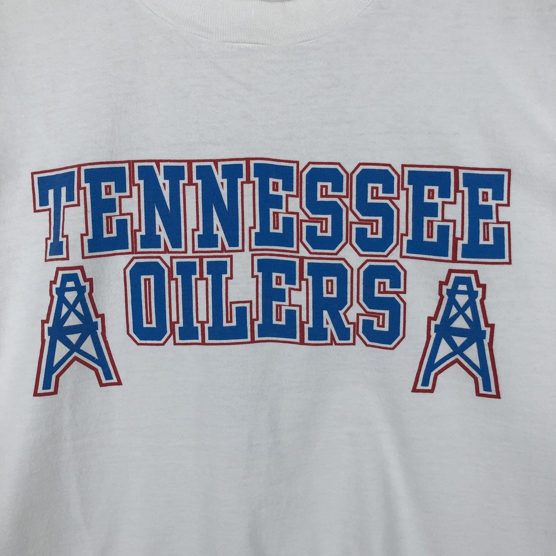 90'S Fruit of the Loom Tennessee Titans sports print t-shirt, made in USA, men's size XL equivalent, vintage. cotton white type Vintage Second Hand