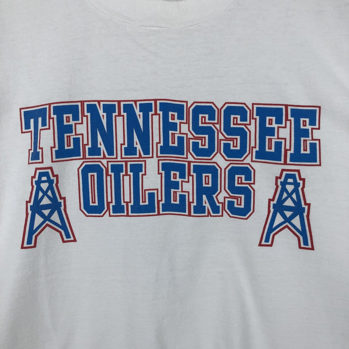 90'S Fruit of the Loom Tennessee Titans sports print t-shirt, made in USA, men's size XL equivalent, vintage. cotton white type Vintage Second Hand