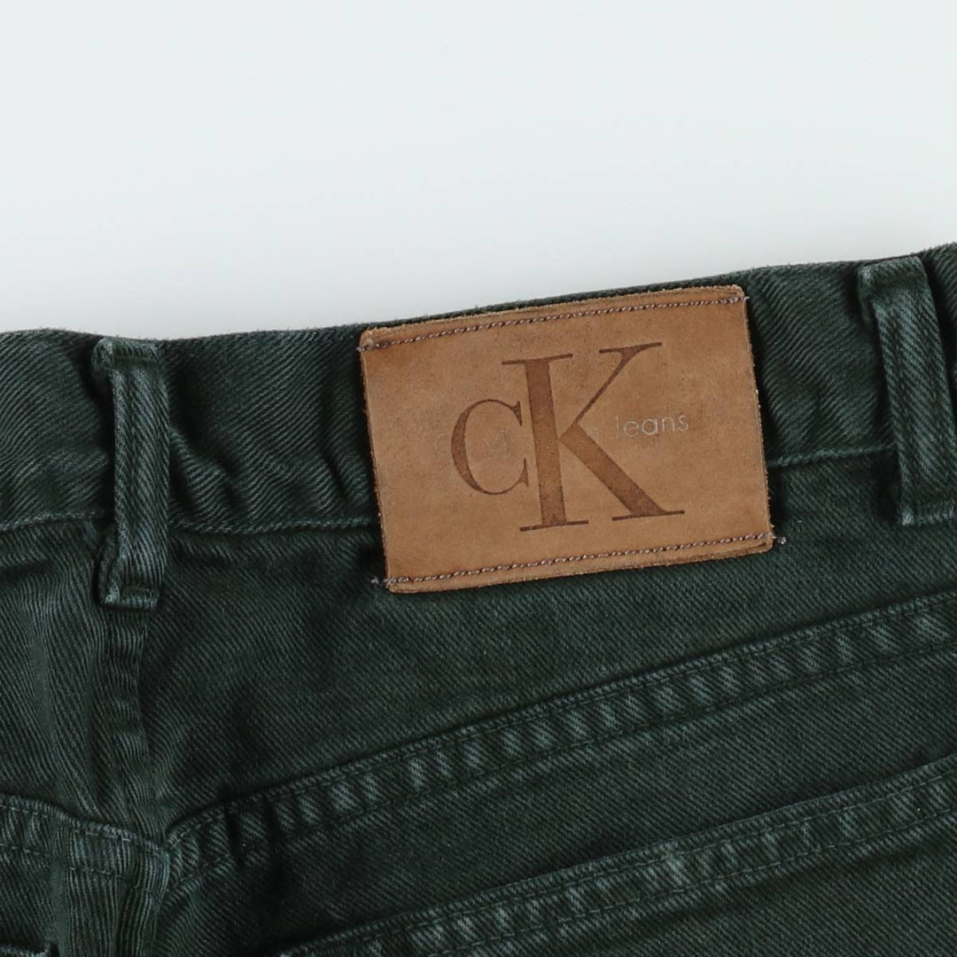 Calvin Klein black denim tapered jeans, made in the USA, men's size W33 (approx.). cotton black type Vintage Second Hand