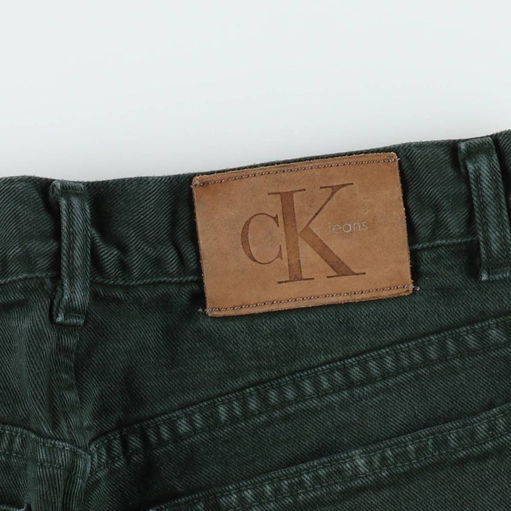 Calvin Klein black denim tapered jeans, made in the USA, men's size W33 (approx.). cotton black type Vintage Second Hand