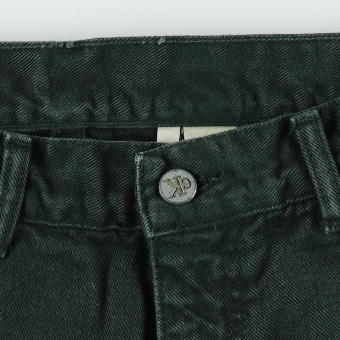Calvin Klein black denim tapered jeans, made in the USA, men's size W33 (approx.). cotton black type Vintage Second Hand