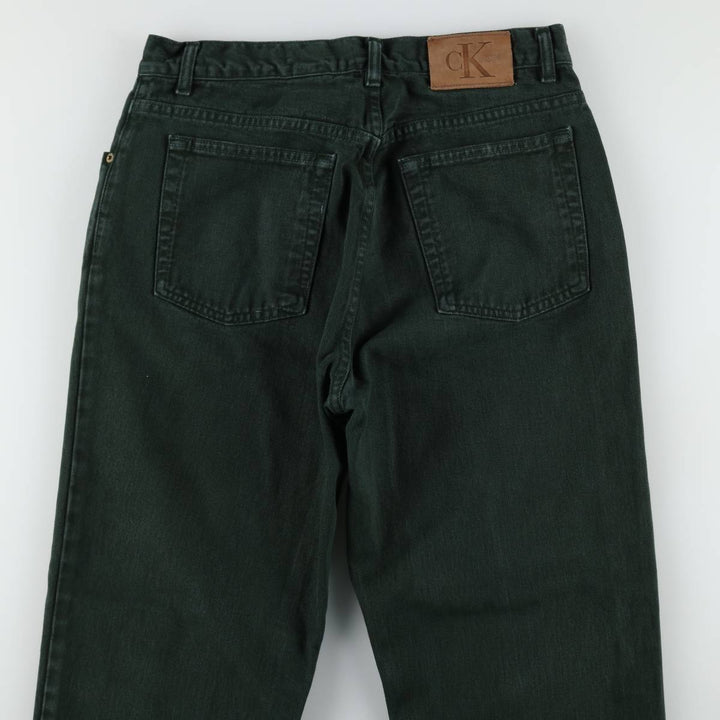 Calvin Klein black denim tapered jeans, made in the USA, men's size W33 (approx.). cotton black type Vintage Second Hand