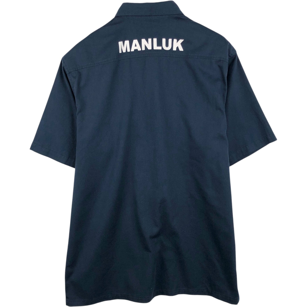 Carhartt back print short-sleeved work shirt, boxy style, men's size XL. polyester navy blue type Vintage Second Hand