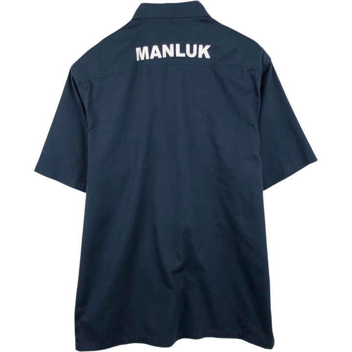 Carhartt back print short-sleeved work shirt, boxy style, men's size XL. polyester navy blue type Vintage Second Hand
